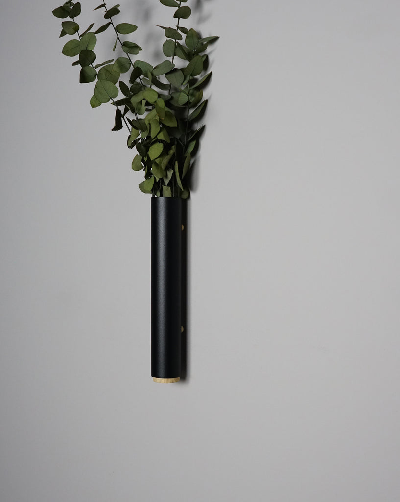 black slim metal wall vase